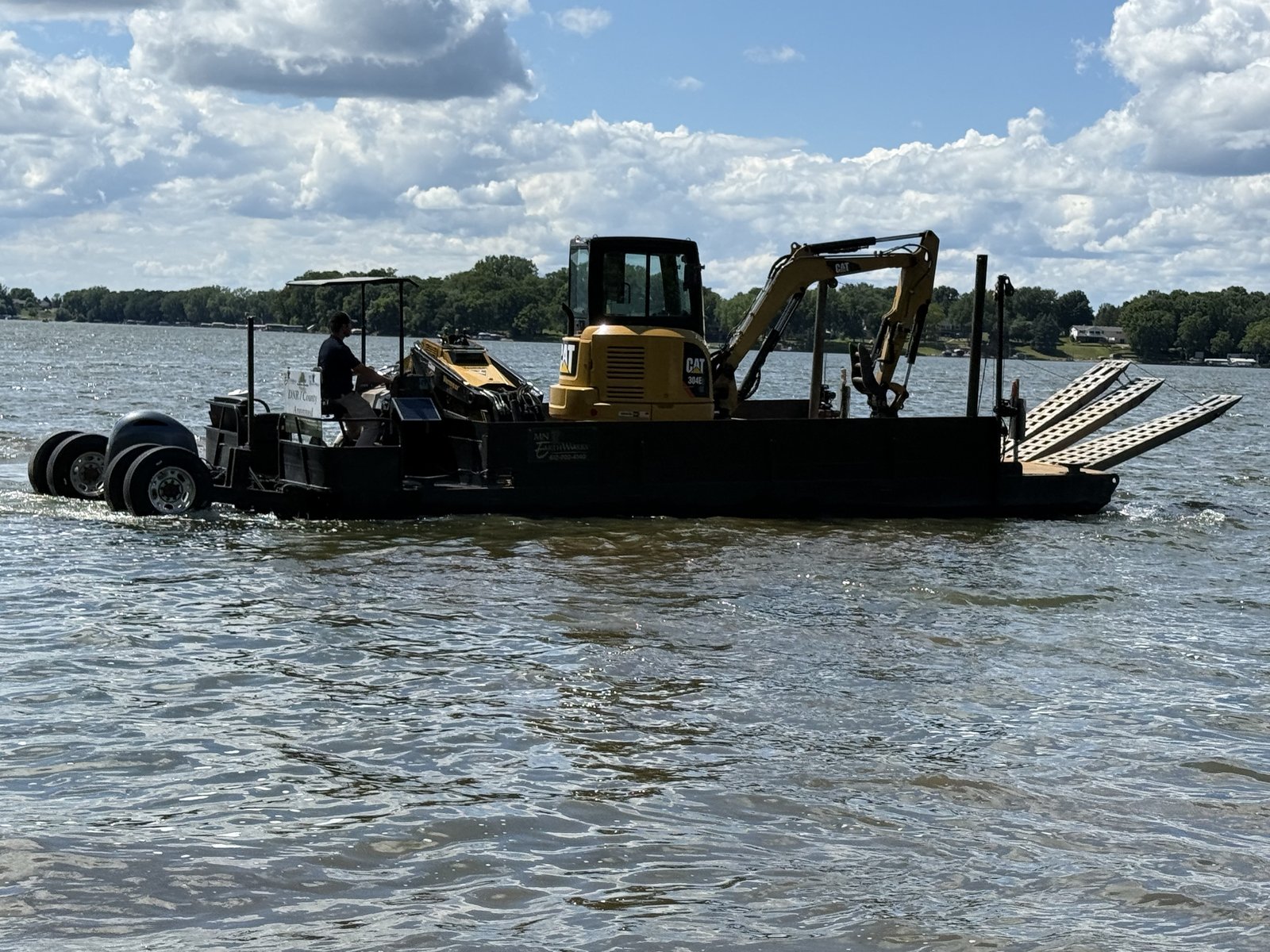 Barge at work on Minnesota lake