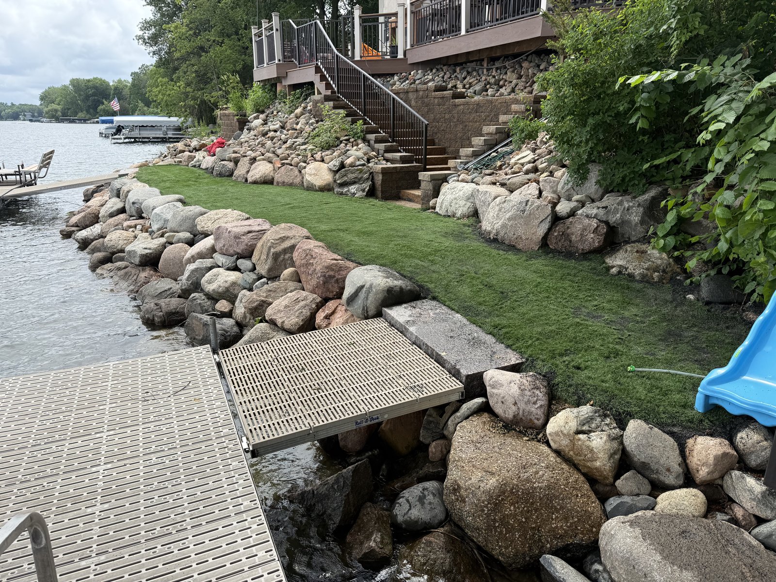 Riprap shoreline restoration with dock